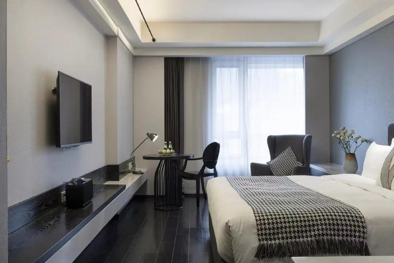 Holz Hotel Shenyang Buitenkant foto